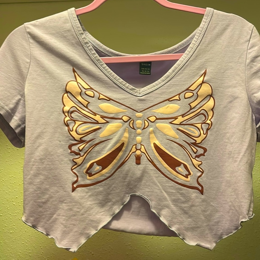 XL crop top by SHEIN in purple. With butterfly design.